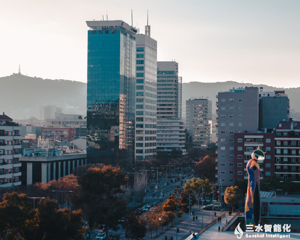 man in blue shirt standing on top of buildin.jpg